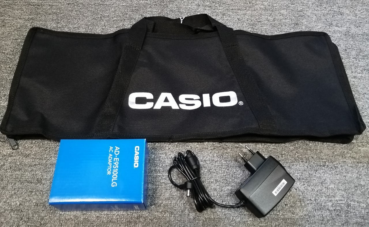 Casio SA BAG Borsa + Casio AD-E95100LG AC alimentatore